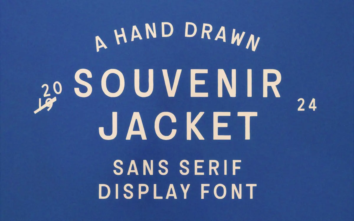 Souvenir Jacket: a hand-inked sans with souvenir-jacket embroidery texture